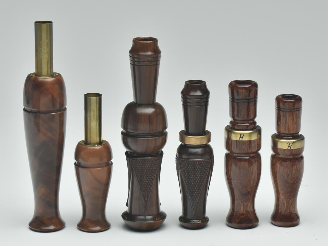 Three duck and goose call sets, various makers.: Three duck and goose call sets, various makers. Charles Hess, checkered calls by Robert Mueller, and Billy John Weiss. Provenance: Kirby Roberts collection.