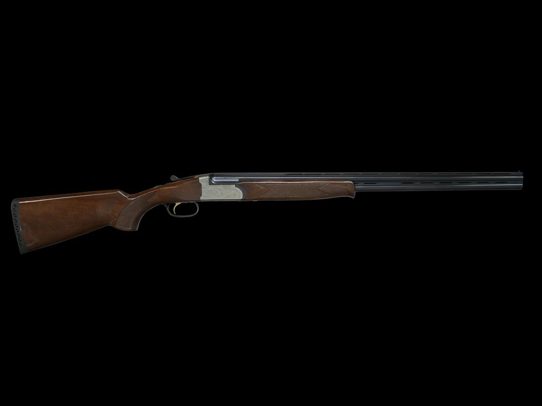 UNUSUAL AMERICAN ARMS "SILVER II" 32 GAUGE OVER UNDER SHOTGUN: SN. A42755. Proved in 1992. Made with 26" , 2-3/4" chambers, low profile matted ventilated top rib that has small brass front bead left side of top bbl "AMERICAN ARMS INC. N.K.C. MO" left bbl marked S