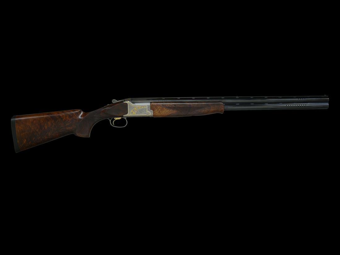 BROWNING CITORI ULTRA GOLDEN CLAYS 12 GAUGE: SN. 24235NTD13. Highly embellished Japanese made O/U double bbl shotgun chambered for 2-3/4" 12 gauge shells, circa 1996. Features high polished blued 28" ported bbls with wide ventilated ribs and rem