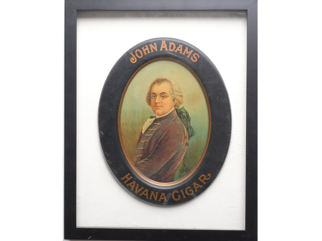 Two tin advertising pieces. (1 of 2)