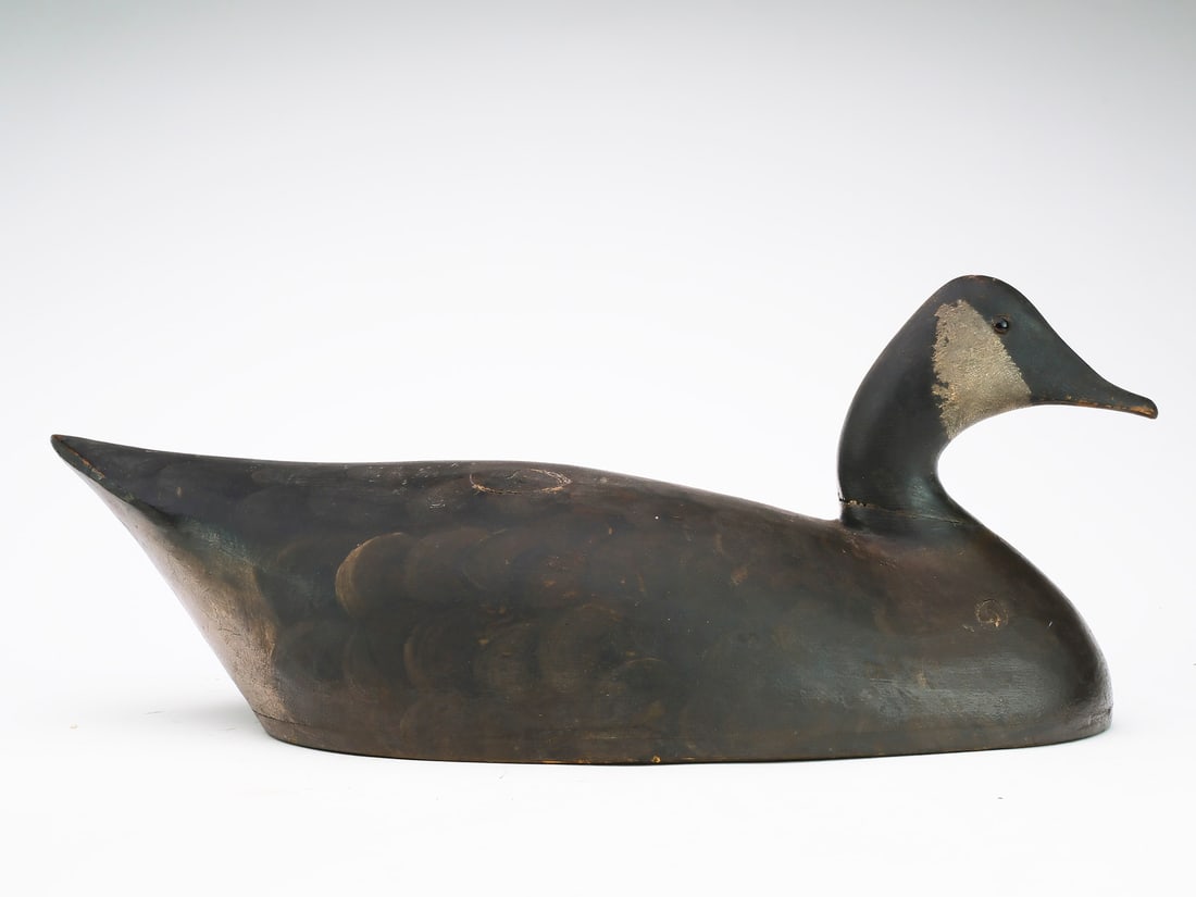 George Warin (1830-1904), Toronto, Ontario.: Outstanding hollow carved Canada goose. Branded "G. and J. Warin. Maker Toronto". Also branded "John Walker". Excellent subtle feather paint detailing. Measures 21.5" long.
