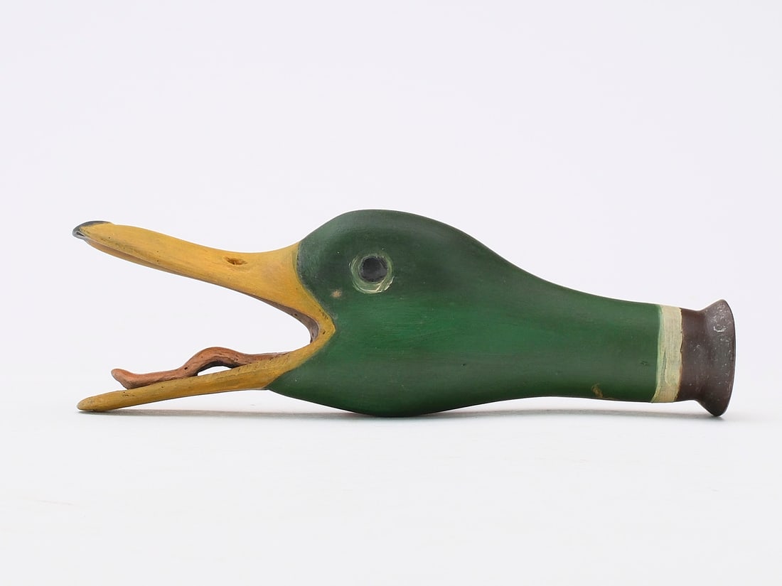 Frank Finney (b.1947), Cape Charles, Virginia.: Calling mallard duck call with open bill and carved tongue. Makers initials painted on the underside. Measures 7" long.