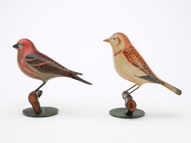 Two carved and painted songbirds, circa 1950.