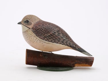Carved wooden whippoorwill, circa 1940.