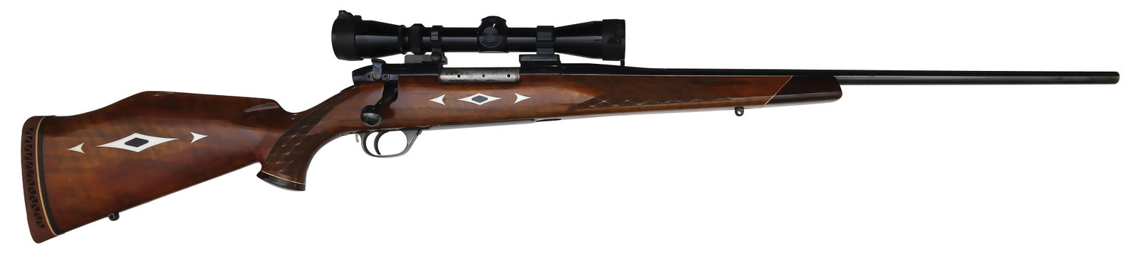 NICE FIELD USED GERMAN WEATHERBY MARK V IN .300 MAGNUM CALIBER.: SN. 21308. Cal. .300 MAG. Built with 24" blued round brl with usual maker's stamps on sides. Blued receiver. Polished bolt. Rosewood & white line capped forestock and pistol grip cap. Stock is skip li
