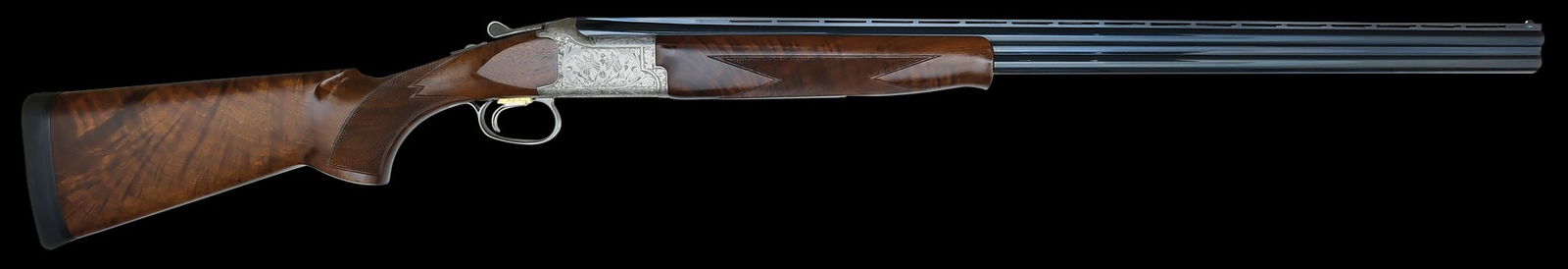 EXCELLENT BROWNING CITORI MODEL 325 GRADE V 20 GAUGE SHOTGUN.: SN. 55913NZ. Cal. 20ga. Built with 30" steel brls that have slightly raised matted ventilated top rib with twin white beads. Right brl tube with proof stamps and "LP/91". Brl lumps are shaded scroll e