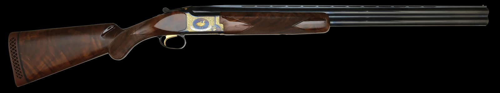 BROWNING CITORI 12 GAUGE MADE FOR DUCKS UNLIMITED AS THEIR YEAR 2000 CONVENTION GUN.: SN. 10660NN131. Cal. 12ga. Built with 28" brls that have slightly raised matted ventilated top rib with small steel front bead. Brl with Invector chokes. Round nose field style walnut forend is checke