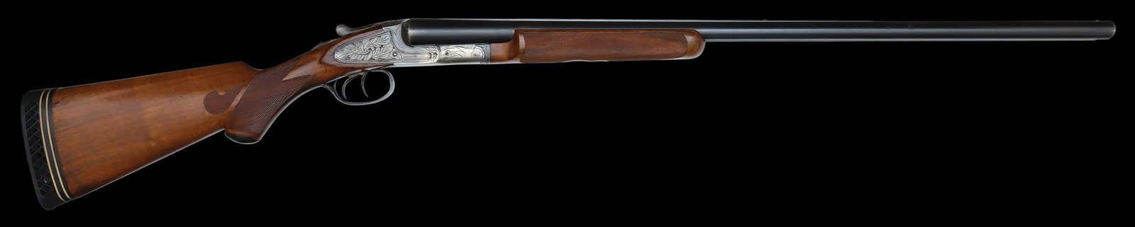 STOUT L.C. SMITH IDEAL GRADE 12 GAUGE SHOTGUN.: SN. RE81069. Cal. 12ga. Built with 30" London steel brls that have matted concave top rib and twin brass beads. Brls with usual maker's stamps. Custom beavertail forend is nicely checkered and has ins