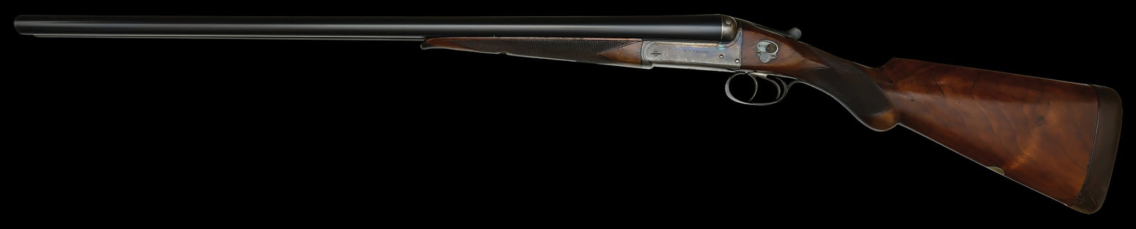 HANDY W.W. GREENER E18 GRADE HEAVY PROOF 12 BORE SHOTGUN.: SN. 63365. Cal. 12ga. Built with 28" steel brls that have matted concave top rib and small steel front bead. Rib with St. Marys Square Birmingham address. Splinter forend checkered in point 