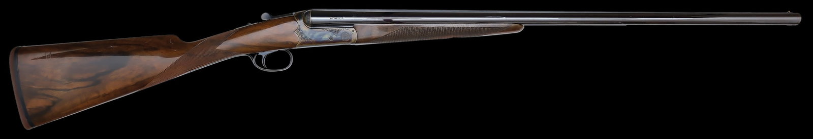EXCELLENT DICKINSON ARMS ESTATE MODEL 20 GAUGE SHOTGUN.: SN. TRJ0422. Cal. 20ga. Built with 28" brls that have slightly raised matted top rib with small brass front bead. Splinter forend with casehardened lightly engraved latch release. Casehardened scallop