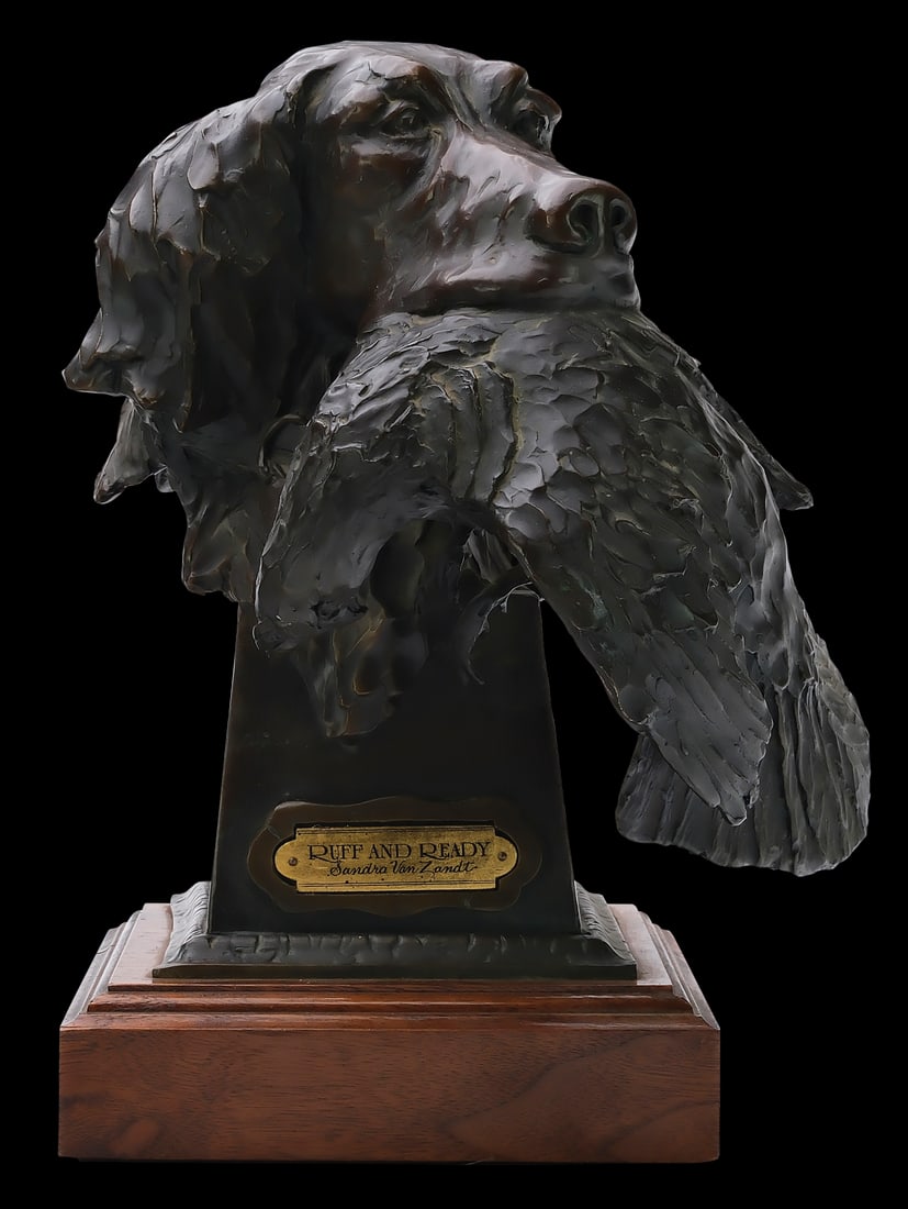 Sandra Van Zandt.: Bronze of setter head holding a ruffed grouse. Titled "Ruff and Ready". Stands 12" tall including base. 