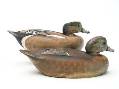 Ken Anger (1905-1961), Dunnville, Ontario.: Pair of widgeon with slight relief wing carving and incised wingtips. Decoys were never rigged or weighted. Measure 13.5" long. Provenance: Peter Brown collection. Private Ohio collection.