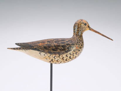 A. Elmer Crowell (1862-1951), East Harwich, Massachusetts.: Early yellowlegs with relief wing and tail feather carving. Measures 11.5&#8221; long. Provenance: Ted and Judy Harmon collection.&#160; Literature: &#8220;The Songless Aviary&#8221; Brian Cullity, cu