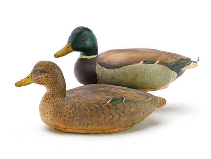 Tom Schroeder (1886-1976), Detroit, Michigan.: Pair of miniature mallards. Slightly turned heads. Metal tail sprig added on drake. Signed and dated 1969 on underside. Measure 5.5" long. Provenance: Len Carnaghi collection.
