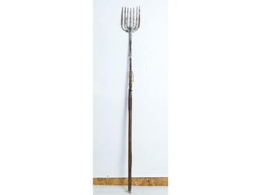 Finely made iron fish spear.