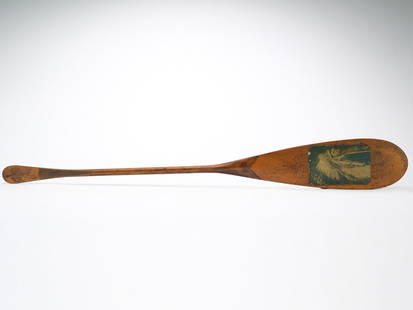 Four souvenir canoe paddles from Massachusetts.: Smallest from Norumbega Park. Two similar paddles from Salisbury Beach, Massachusetts. Largest with wood burned pine cones&#160;and applied portrait of an Indian chief. Measure from 9" - 35.75" long.