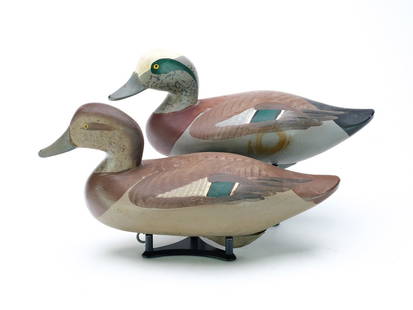 Madison Mitchell (1901-2003), Havre de Grace, Maryland.: Pair of widgeon. Drake with slightly turned head, unsigned. Hen is signed and dated 1980 in elctropen. Measure 14.5" and 15" long. Provenance: Purchased from the maker. Bobby Lewis collection.