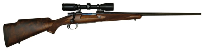 MARCUS HUNT ENGRAVED AND GOLD INLAID JOHN RIGBY AND COMPANY MAUSER ACTION RIFLE WITH SCOPE.