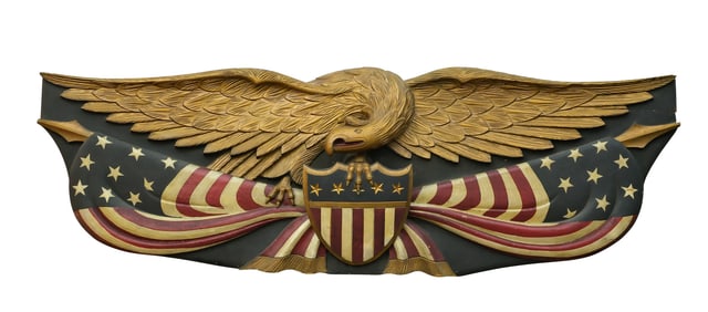 Important patriotic carved wooden eagle.
