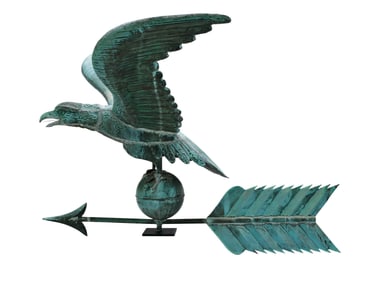 Full body spring wing eagle on ball top of arrow.