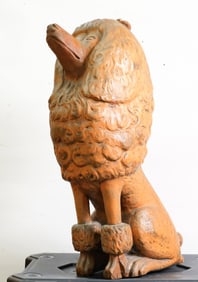 Carved wooden full size poodle.