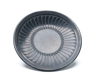 A large plate or charger by Maria and Santana Martinez