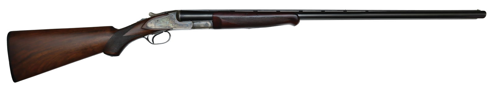 SCARCE FULLY OPTIONED AND FINE ORIGINAL CONDITION L.C. SMITH TRAP GRADE 12 BORE.: SN. RE123386. Cal. 12ga. Built on a regular weight frame with 32" ventilated rib brls that have twin white beads and usual maker's stamps. Brl flats with SN and "T". Reinforced forend loop. Schnabel