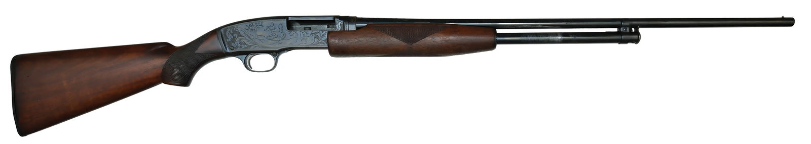 HANDSOME FIELD USED ENGRAVED WINCHESTER MODEL 42.: SN. 15039. Cal. .410ga. Built with 26" factory cylinder choked plain brl that has usual makers stamps. Breech end of brl with 2-1/2" scroll wedge. Walnut forend is diamond pattern checkered. Blued rec