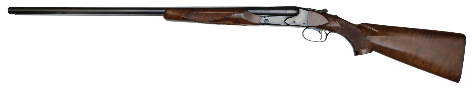 STUNNING NEAR MINT WINCHESTER MODEL 21 16 GAUGE WITH FACTORY ORIGINAL BOX.: SN. 28982. Cal. 16ga. Built with 28" brls that have matted concave top rib with small steel front bead. Left tube with usual maker's stamps at breech end. Bottoms of tubes with Mod/Full choke stamps.