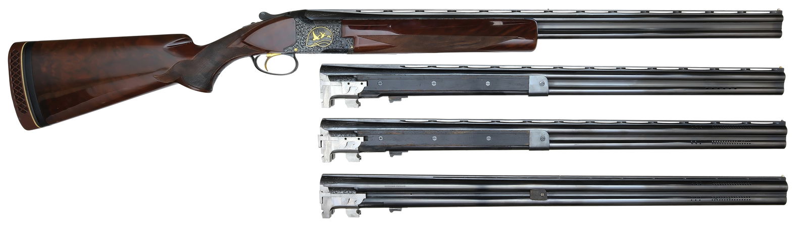 SKEET HOA RECOGNIZED SHOOTER IVAN MORGAN’S BROWNING SUPERPOSED MIDAS GRADE FOUR BARREL SKEET: SET WITH CASE. SN. 47153S75. Cal. 12ga, 20ga, 28ga & .410ga. Built in 1975, this scarce 4 brl Skeet set was used extensively by National Skeet Shooting Association (NSSA) Hall Of Fame Shooter Iva