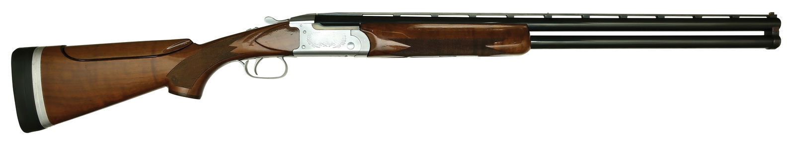 EVER USEFUL REMINGTON MODEL 3200 WITH SUB GAUGE INSERTS AND CASE.: SN. OU5844. Cal. 12ga. Built with 27-3/4" brls that have matted ventilated top rib with steel mid and white front bead. Brls with maker's proof stamps. Finger groove walnut forend is checkered in poin