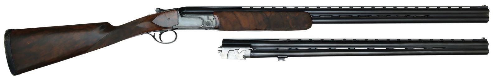 FIELD USED 20 BORE PERAZZI MX20 TWO BARREL SET SHOTGUN.: SN. 86206. Cal. 20ga. Proved in 1992 (BB date code) and built with 29-1/2" brls that have matted ventilated top rib with steel mid and white front bead. Mid rib is also ventilated. Brl lumps with SN a