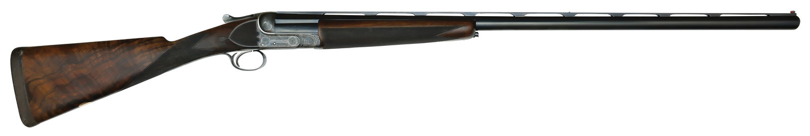 BEAUTIFUL JOSEPH LANG & SON SINGLE BARREL TRAP 12 BORE WITH CASE.: SN. 16328. Cal. 12ga. Built with 32" half octagon half round ventilated rib brl that has white mid and red front bead. Brl lumps are scroll engraved and side of brl engraved "JOSEPH LANG & SON