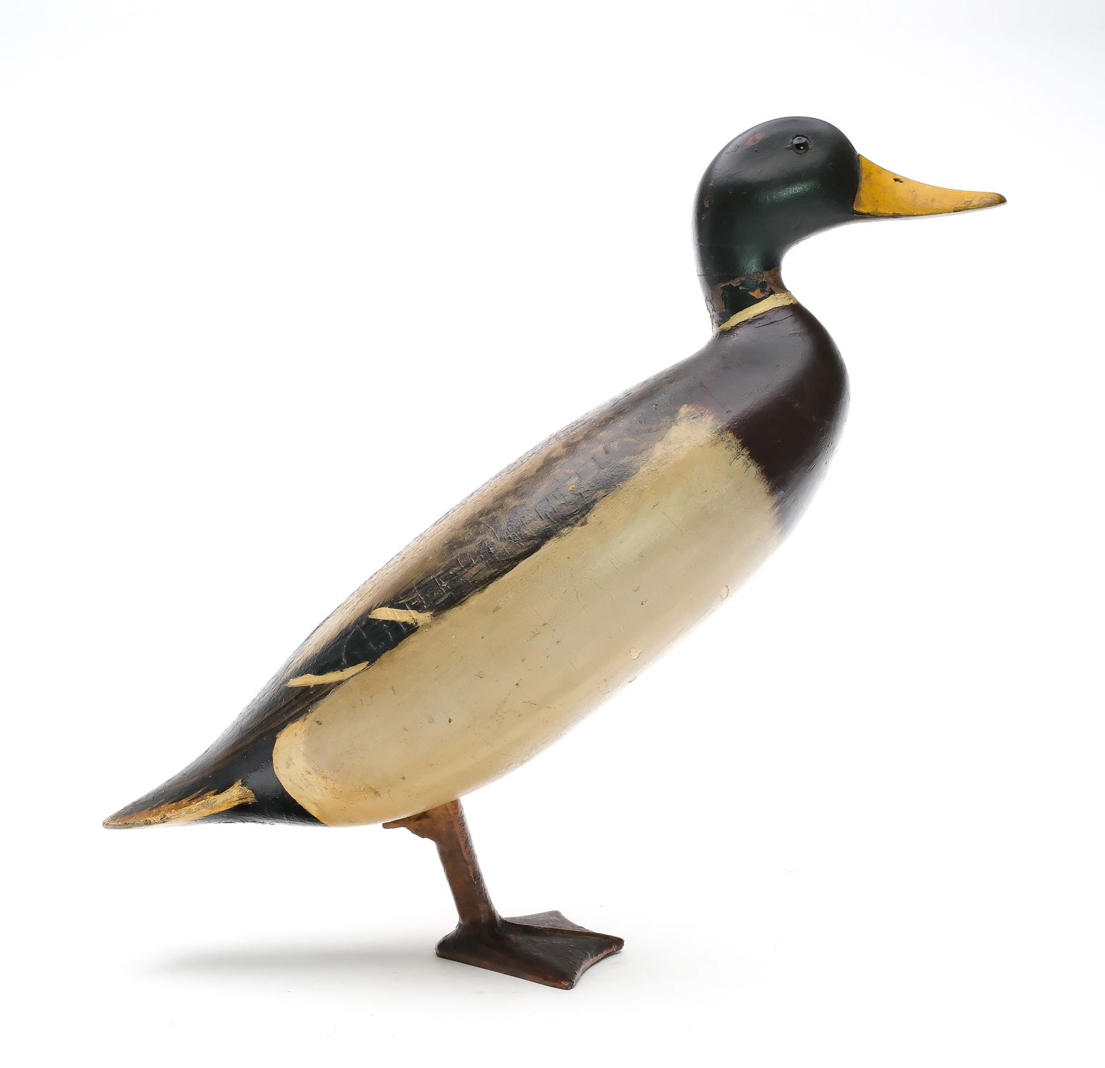 Charles Schoenheider Sr. (1854-1924), Peoria, Illinois.: Exceedingly rare standing mallard ice duck. Hollow carved, with removable iron foot. Believed to be the only standing mallard by the maker. Measures 17" long. Provenance: Jim and Diane Cook collection