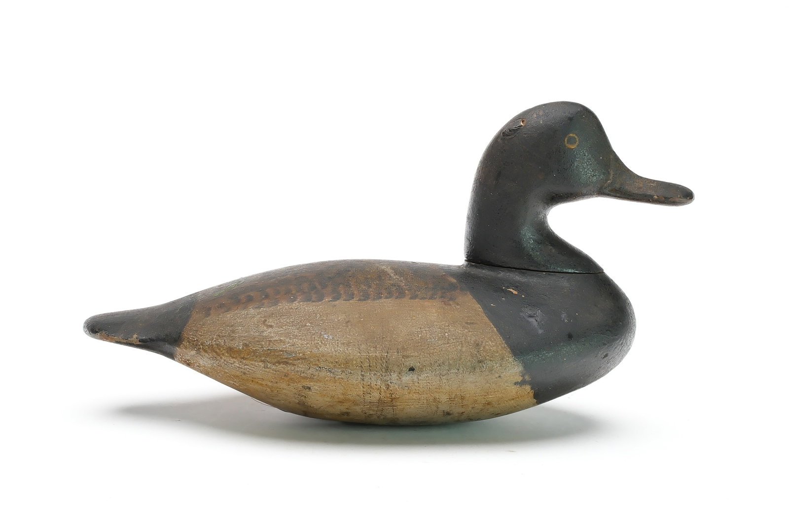 Ben Dye (1827-1896), Perryville, Maryland.: Outstanding bluebill with slightly raised neck seat and relief bill carving. Doherty collection sticker on underside. Measures 11.75" long. Provenance: Jim and Patricia Doherty collection. Jim and Dia