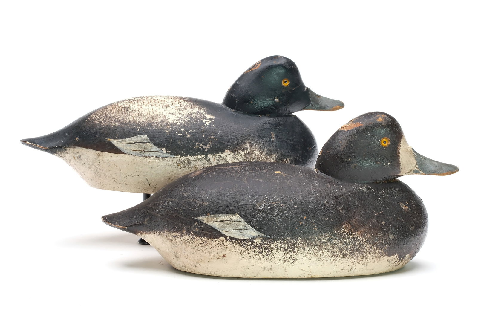 Mason Decoy Factory (1889-1924), Detroit, Michigan.: Rare rigmate pair of lowhead bluebills. Hollow carved premier grade. Both branded "Fuller." Measure 13.5" long. Provenance: Fuller collection. Kirt Whaley collection. Jim and Diane Cook collection. Li