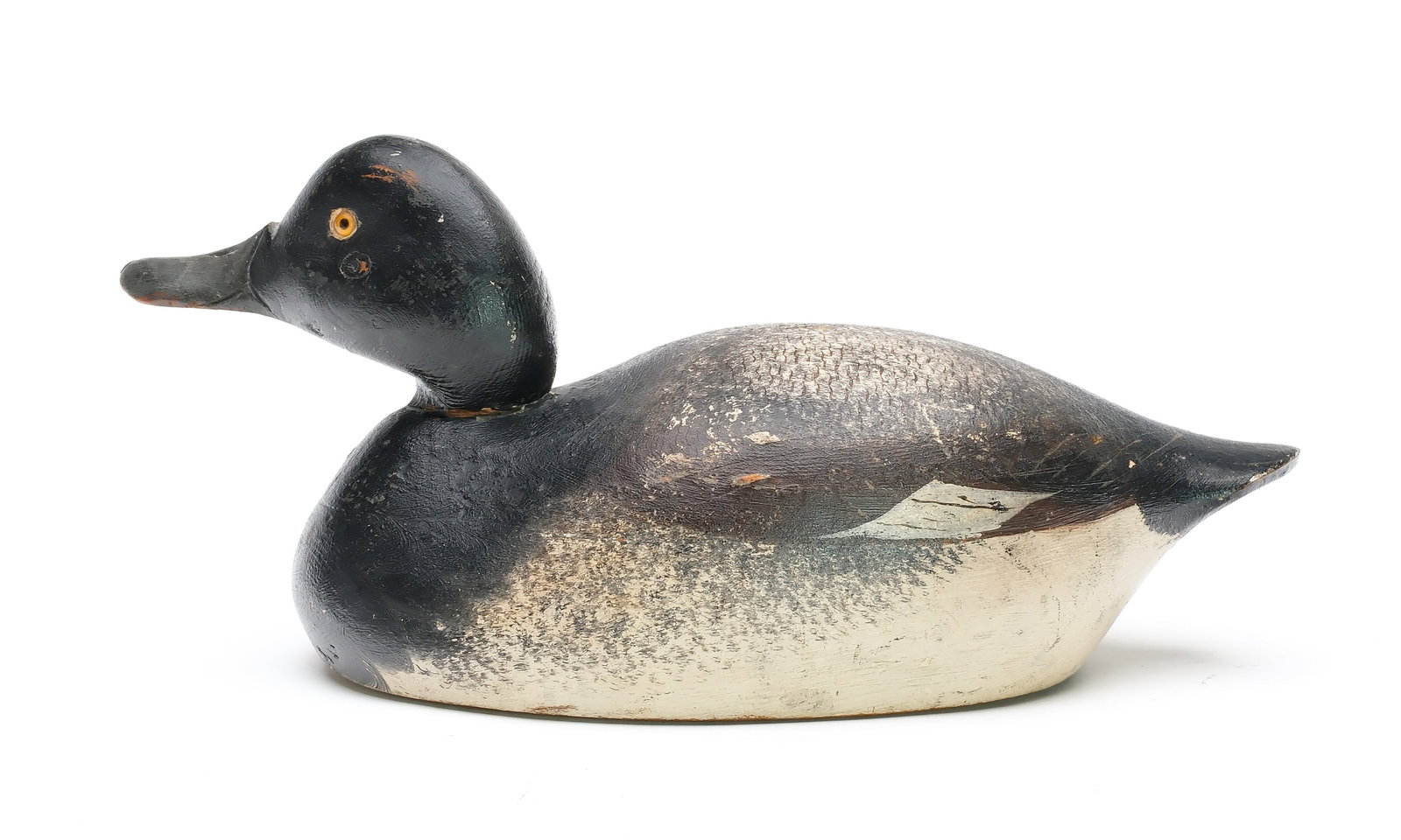 Mason Decoy Factory (1889-1924), Detroit, Michigan.: Early bluebill. Hollow carved premier grade with slightly turned head. "Fuller" branded in underside. Measures 13" long. Provenance: Fuller collection. Kirt Whaley collection. Jim and Diane Cook colle