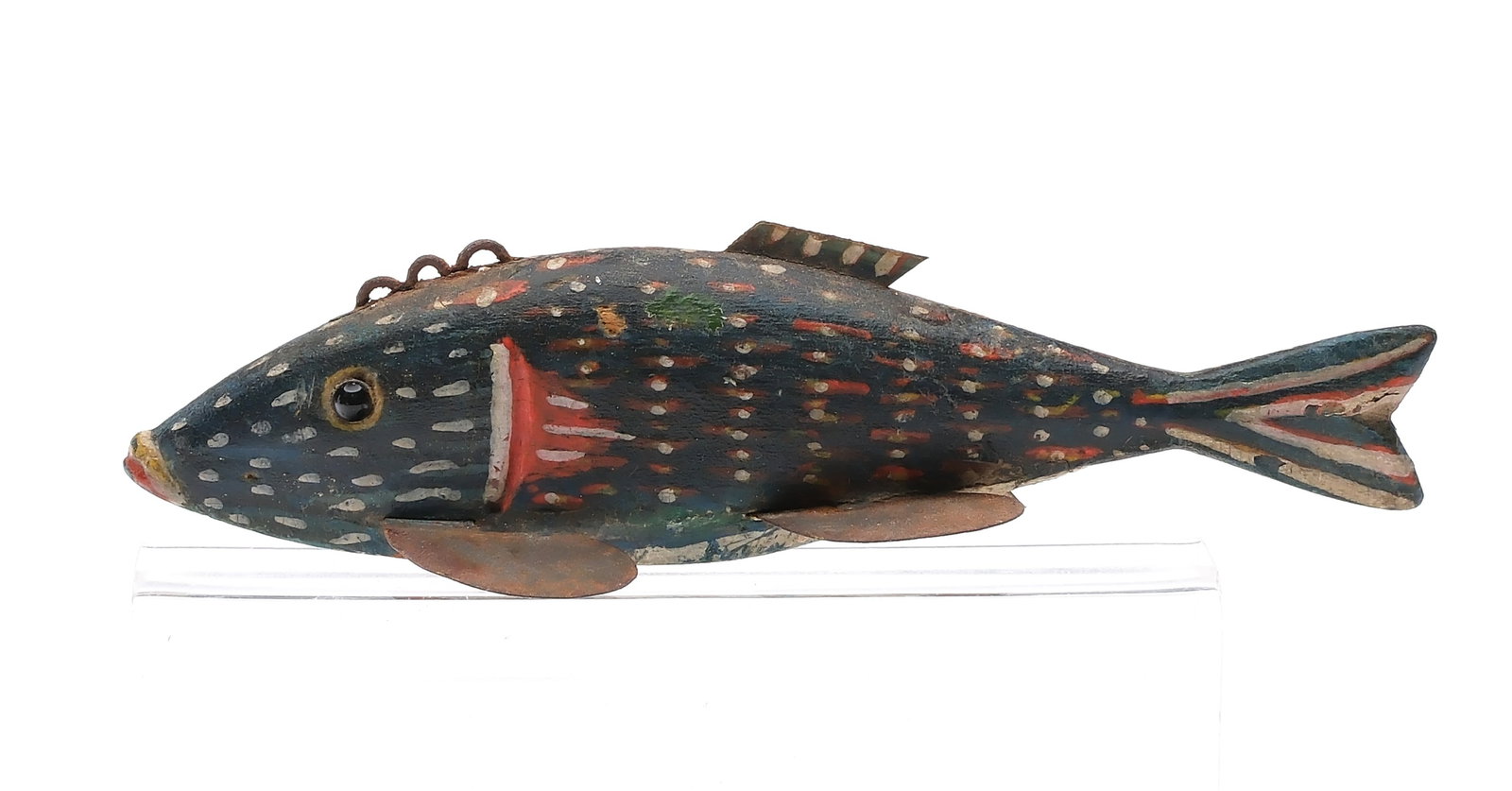 Monroe kissing fish, Monroe, Michigan, 1st quarter 20th century.: Glass eyes. Carved lips and gills. Metal fins. Measures 6" long. Provenance: Private Michigan collection.