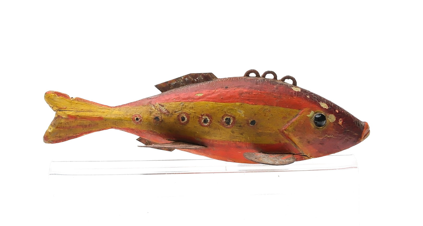 Monroe kissing fish, Monroe, Michigan, 1st quarter 20th century.: Glass eyes. Carved lips and gills. Metal fins. Measures 5" long. Provenance: Private Michigan collection.