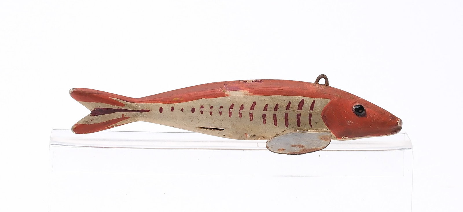 Monroe kissing fish, Monroe, Michigan, 1st quarter 20th century.: Glass eyes. Carved mouth. Metal fins, two of which are missing. Measures 4.5" long. Provenance: Private Michigan collection.