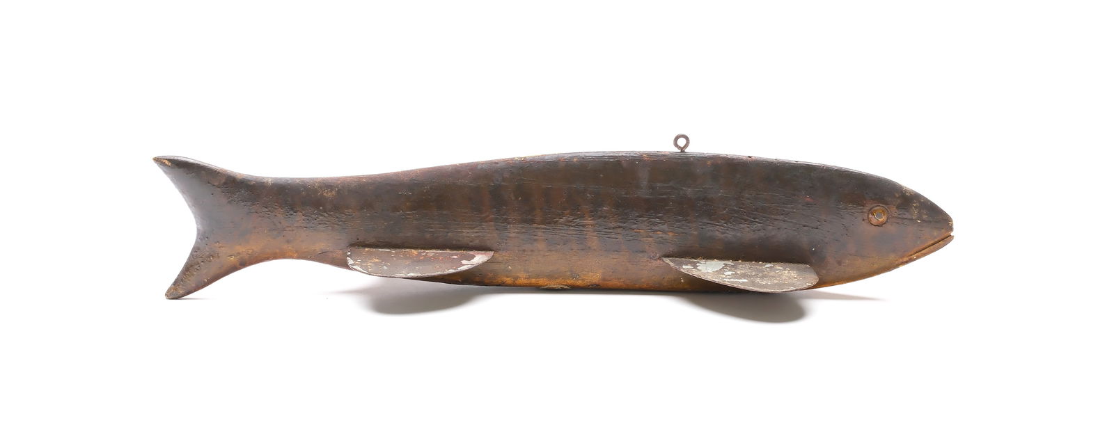 Frank Kuss (1871-1950), Mt. Clemens, Michigan.: Bass fish decoy, 1st quarter 20th century. Painted tack eyes, and carved mouth. Four metal fins. Measures 12" long. Provenance: Private Michigan collection.