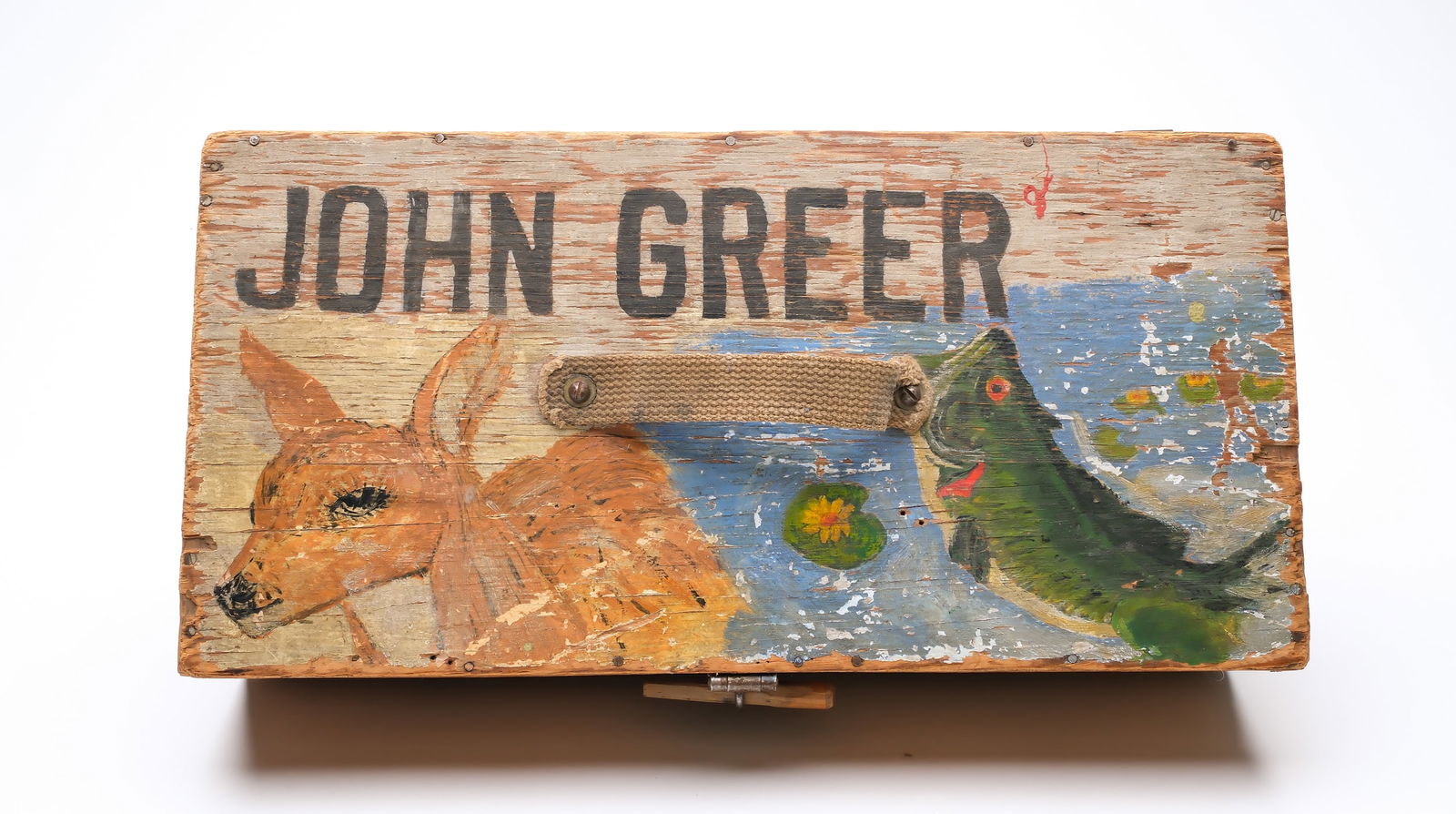 A tackle box and rig of ice spearing decoys.: Top of box is marked John Greer and paint decorated. Box measures 8.25" x 17" x 5.5" deep. Box contains fish decoys 16 vintage ice spearing decoys. All from Minnesota. One pan fish and the rest are mo