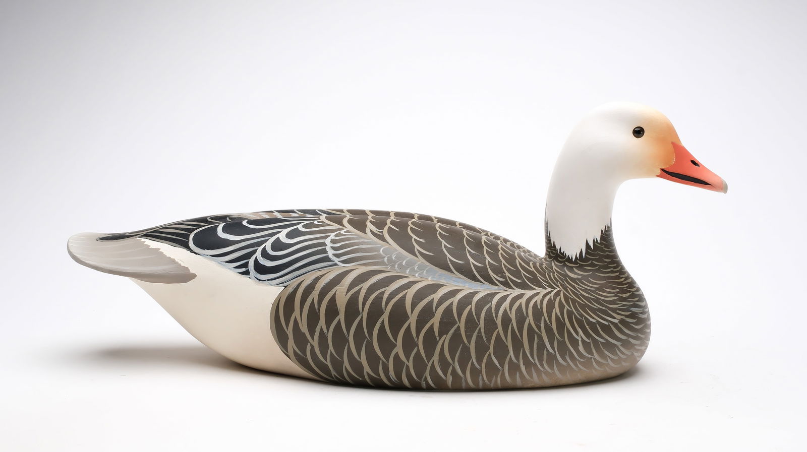 Oliver Lawson (b.1938), Crisfield, Maryland.: Blue goose. Hard balsa body with relief wing carving and slightly turned head. Identified, signed, and dated 1986 on underside. Measures 22" long.
