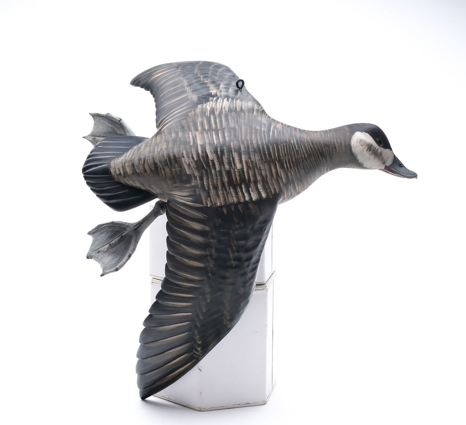 Mike Borrett, (b.1960), Madison, Wisconsin.: Pair of flying ruddy ducks. Outstretched wings with deep relief feather carving. "Borrett" carved in wings. Measure 14.5" long, with a 18" wingspan.