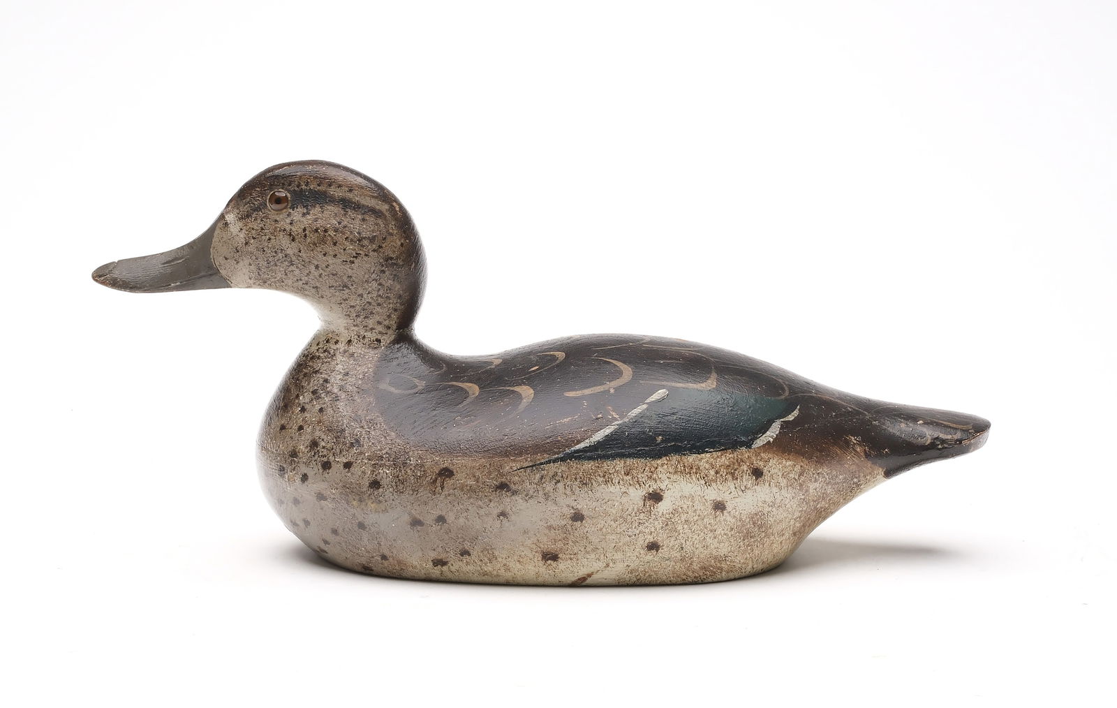 Mason Decoy Factory (1889-1924), Detroit, Michigan.: Greenwing teal hen. Hollow carved premier grade. Branded "Taylor" on underside. Measures 12.75" long.