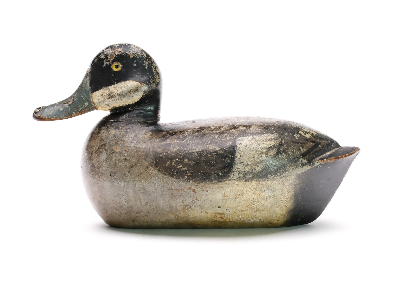 Jack Schwartz (early 20th century), Lacon, Illinois.: Hollow carved bluebill hen with wide cheek carving. Comb feather paint detail on sides and breast. Measures 12" long.