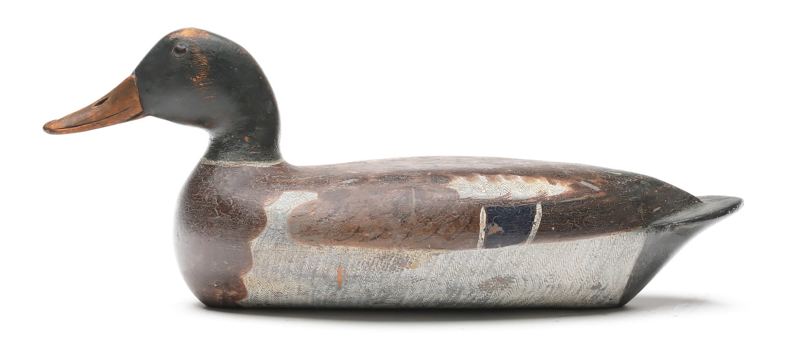 Bert Graves (1880-1956), Peoria, Illinois.: Mallard. Hollow carved comb feather paint detail. Measures 17" long.