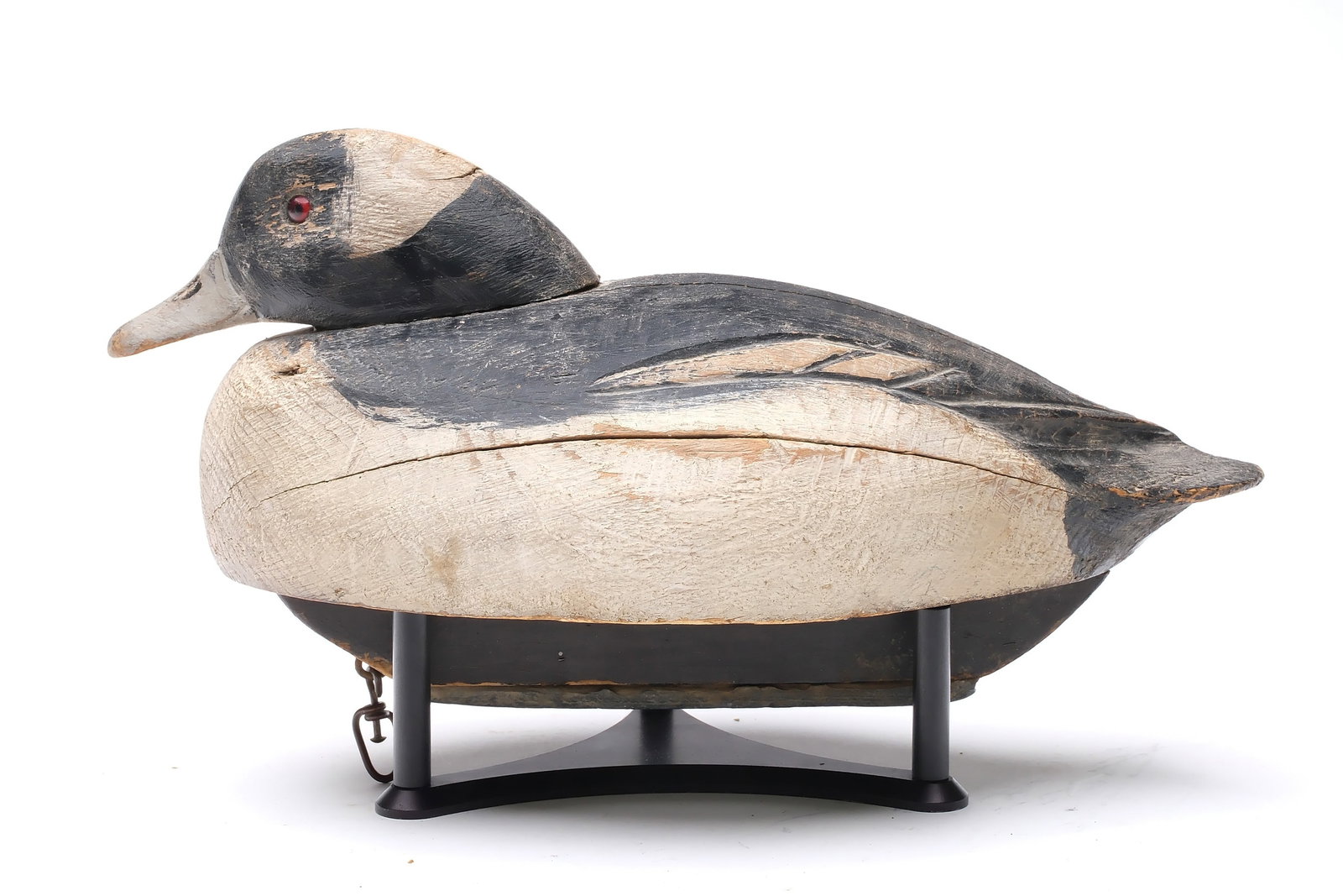 Ben Schmidt (1884-1968), Detroit, Michigan.: Rare tucked head bufflehead. Slight relief wing carving. "Jim Mcilhinny" branded in underside. Measures 12.25" long.