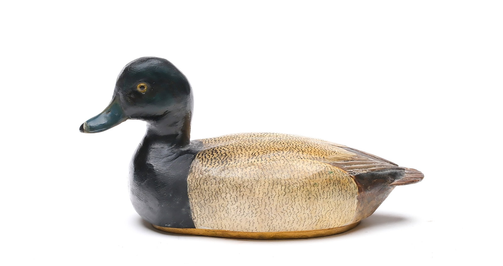 Tom Schroeder (1886-1976), Detroit, Michigan.: 1/3 size bluebill. Slightly turned head and relief wingtip carving. Measures 7.5" long.