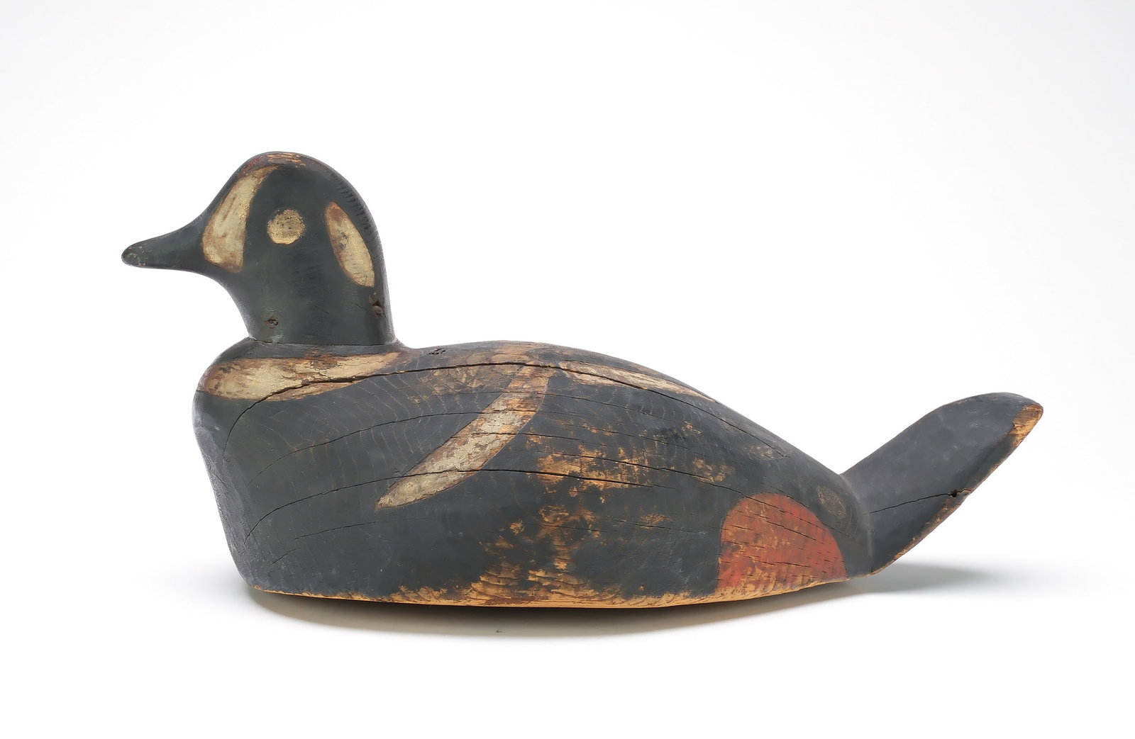 George May, Nova Scotia, circa 1880.: Extremely rare working harlequin duck. Dr. George Ross Starr collection ink stamp twice on underside. One of only five known to exist. Measures 16.5" long. Provenance: Dr. George Ross Starr Jr collect